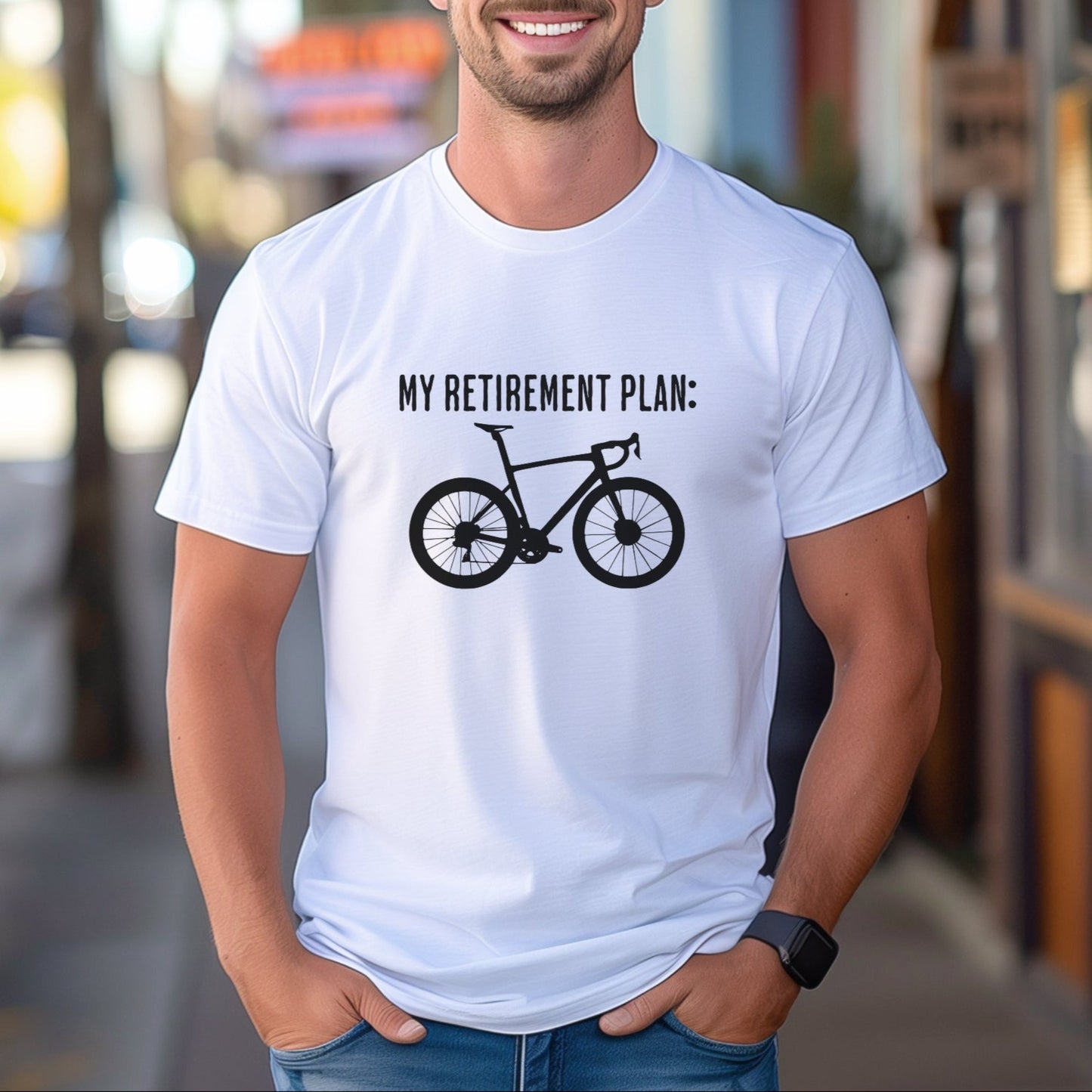 Man wearing a white t-shirt with a bicycle graphic and text, standing on a street.