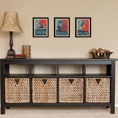 Black console table with wicker baskets and framed artwork on a beige wall.